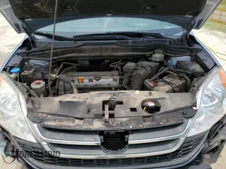 2010 Honda CR-V LX z VIN JHLRE3H38AC009718, wystawiony jako Copart lot #57934195 z przebiegiem 177 795 mil mil oraz Szkoda całkowita • Salvage title. Historia ofert i sprzedaży dostępna na DreamBid. Obrazek 12.