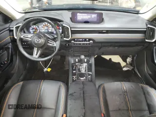 2024 Mazda CX-50 Premium z VIN 7MMVABDY0RN174004, wystawiony jako Copart lot #44727115 z przebiegiem 4 796 mil mil oraz Szkoda całkowita • Salvage title. Historia ofert i sprzedaży dostępna na DreamBid. Obrazek 8.
