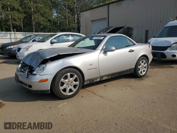 1999 Mercedes-Benz SLK-Class with VIN WDBKK47F9XF127582, listed as a Copart auction lot 71345494 with 187,302 mi miles and Salvage Title. Bid and sale history available at carsss.com. Image 1.