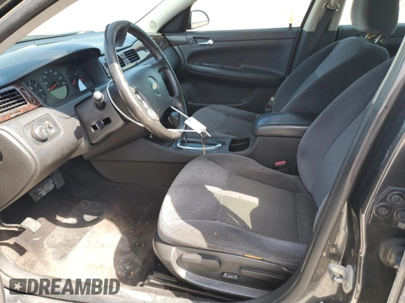 2014 Chevrolet Impala LS z VIN 2G1WA5E39E1162205, wystawiony jako Copart lot #56305635 z przebiegiem 178 610 mil mil oraz Szkoda całkowita • Salvage title. Historia ofert i sprzedaży dostępna na DreamBid. Obrazek 7.