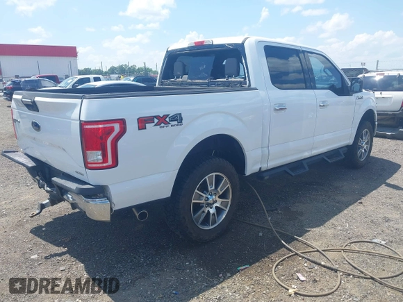 2015 Ford F-150 XLT with VIN 1FTEW1EFXFKD32631, listed as a IAAI auction lot 42454554 with 162,104 mi miles and . Bid and sale history available at DreamBid. Image 4.