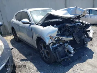 2018 Alfa Romeo Stelvio z VIN ZASFAKAN1J7B89142, wystawiony jako IAAI lot #42192248 z przebiegiem Nie podano mil oraz . Historia ofert i sprzedaży dostępna na DreamBid. Obrazek 1.