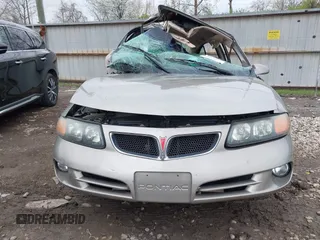 2002 Pontiac Bonneville SE z VIN 1G2HX54K624146331, wystawiony jako IAAI lot #41924115 z przebiegiem 83 665 mil mil oraz . Historia ofert i sprzedaży dostępna na DreamBid. Obrazek 12.