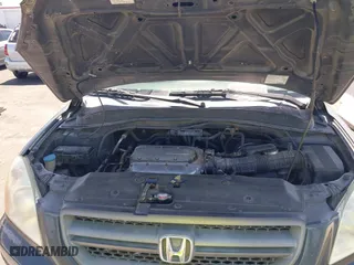2004 Honda Pilot EX with VIN 2HKYF18514H623272, listed as a IAAI auction lot 42020669 with 186,766 mi miles. Bid and sale history available at carsss.com. Image 10.