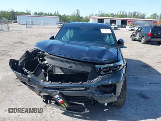 2022 Ford Explorer ST-Line z VIN 1FMSK7KH9NGB68860, wystawiony jako IAAI lot #42287420 z przebiegiem 25 579 mil mil oraz . Historia ofert i sprzedaży dostępna na DreamBid. Obrazek 13.