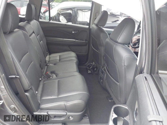 2019 Honda Pilot Touring 8-Passenger with VIN 5FNYF5H93KB028641, listed as a IAAI auction lot 42524078 with 56,744 mi miles and . Bid and sale history available at DreamBid. Image 8.