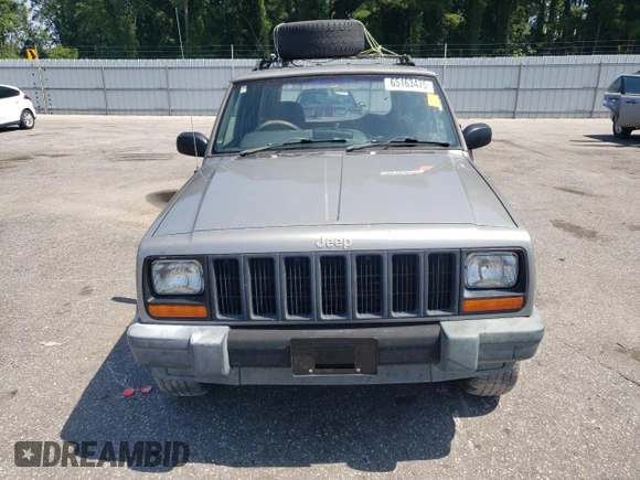 2000 Jeep Cherokee with VIN 1J4FN28S6YL210944, listed as a Copart auction lot 65163475 with 147,609 mi miles and Salvage title. Bid and sale history available at DreamBid. Image 5.