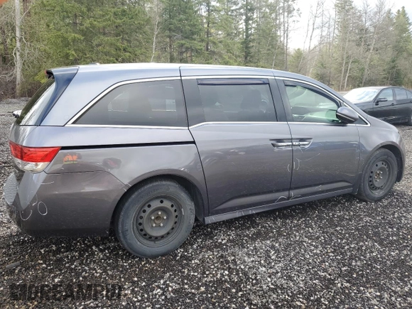 2014 Honda Odyssey Touring z VIN 5FNRL5H98EB512144, wystawiony jako Copart lot #69987533 z przebiegiem 184 231 mil mil oraz Szkoda całkowita • Salvage title. Historia ofert i sprzedaży dostępna na DreamBid. Obrazek 3.