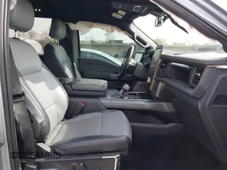 2022 Ford F-150 Lightning Pro z VIN 1FTVW1EL0NWG16234, wystawiony jako IAAI lot #41220079 z przebiegiem 40 541 mil mil oraz . Historia ofert i sprzedaży dostępna na DreamBid. Obrazek 5.