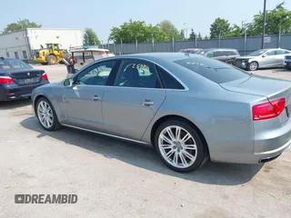 2013 Audi A8 4.0L with VIN WAUA2AFD5DN021950, listed as a IAAI auction lot 42472512 with 126,964 mi miles and . Bid and sale history available at DreamBid. Image 3.