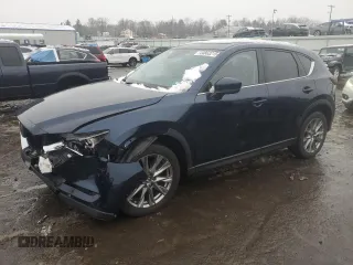 2021 Mazda CX-5 Grand Touring with VIN JM3KFBDM0M0391325, listed as a Copart auction lot 44863215 with 21,997 mi miles and Salvage Title. Bid and sale history available at DreamBid. Image 1.