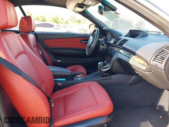 2011 BMW 1 Series 128i with VIN WBAUL7C55BVM81049, listed as a IAAI auction lot 41892811 with 50,659 mi miles and . Bid and sale history available at carsss.com. Image 5.