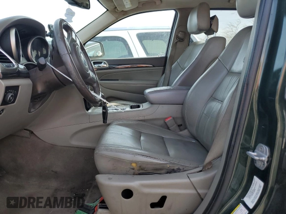 2011 Jeep Grand Cherokee Laredo with VIN 1J4RR4GG2BC636423, listed as a Copart auction lot 51169135 with 143,058 mi miles and Salvage Title. Bid and sale history available at DreamBid. Image 7.