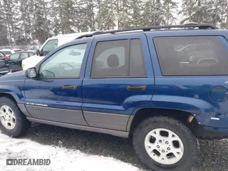 2001 Jeep Grand Cherokee Laredo with VIN 1J4GW48N21C730703, listed as a IAAI auction lot 41581667 with 111,054 mi miles. Bid and sale history available at carsss.com. Image 15.
