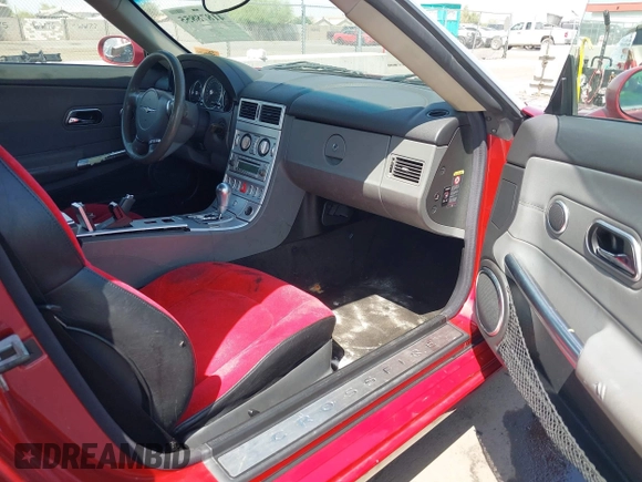2005 Chrysler Crossfire Limited z VIN 1C3AN65L65X057205, wystawiony jako IAAI lot #41878855 z przebiegiem 209 199 mil mil oraz . Historia ofert i sprzedaży dostępna na DreamBid. Obrazek 5.