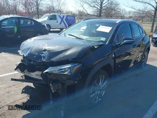 2021 Lexus UX with VIN JTHR9JBH7M2052899, listed as a IAAI auction lot 41878321 with 48,837 mi miles. Bid and sale history available at carsss.com. Image 2.