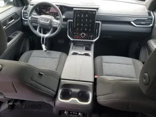 2025 GMC Acadia FWD Elevation z VIN 1GKENKRS2SJ130256, wystawiony jako Copart lot #41656905 z przebiegiem 1 664 mil mil oraz Czysty tytuł • Clean title. Historia ofert i sprzedaży dostępna na DreamBid. Obrazek 8.