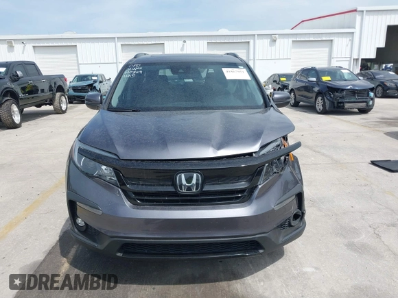 2021 Honda Pilot Special Edition with VIN 5FNYF5H27MB046775, listed as a IAAI auction lot 41867951 with 66,108 mi miles and . Bid and sale history available at DreamBid. Image 12.