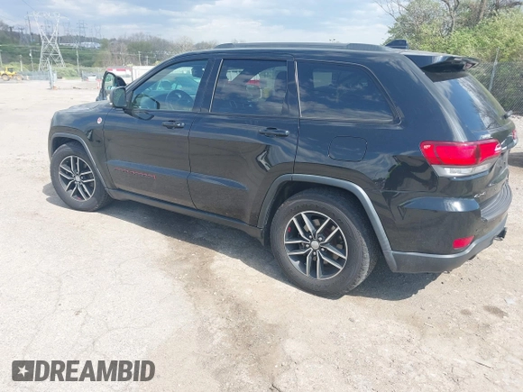 2017 Jeep Grand Cherokee Trailhawk with VIN 1C4RJFLG3HC674489, listed as a IAAI auction lot 42049006 with 91,892 mi miles and . Bid and sale history available at DreamBid. Image 3.