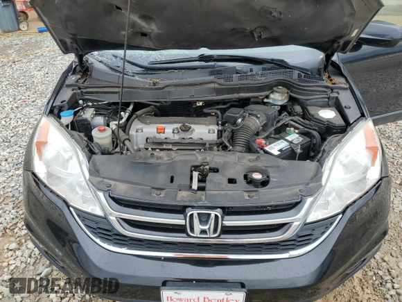2011 Honda CR-V EX-L z VIN 5J6RE3H7XBL054946, wystawiony jako Copart lot #58640825 z przebiegiem 126 255 mil mil oraz Szkoda całkowita • Salvage title. Historia ofert i sprzedaży dostępna na DreamBid. Obrazek 12.