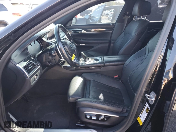 2016 BMW 7 Series 740i with VIN WBA7E2C52GG504096, listed as a Copart auction lot 49258935 with 111,267 mi miles and Salvage Title. Bid and sale history available at carsss.com. Image 7.