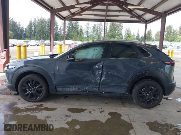 2023 Mazda CX-30 S Carbon Edition with VIN 3MVDMBCM1PM558865, listed as a IAAI auction lot 42298416 with 19,276 mi miles and . Bid and sale history available at DreamBid. Image 15.