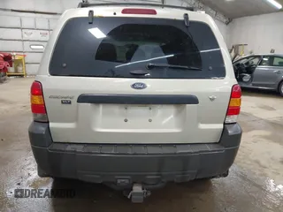 2005 Ford Escape XLT with VIN 1FMYU03115KA29039, listed as a IAAI auction lot 42159988 with 240,047 mi miles and . Bid and sale history available at DreamBid. Image 16.