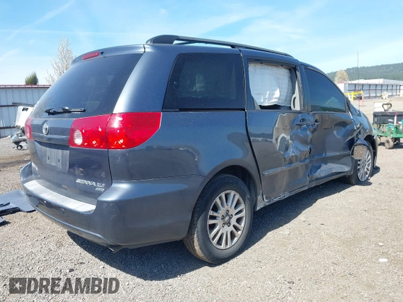 2009 Toyota Sienna XLE with VIN 5TDBK22C69S027767, listed as a IAAI auction lot 42029832 with 200,752 mi miles and . Bid and sale history available at DreamBid. Image 4.