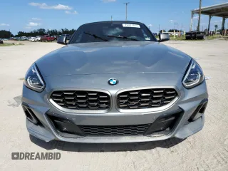 2024 BMW Z4 sDriveM40i with VIN WBAHF9C02RWY35106, listed as a Copart auction lot 76471014 with 0 mi miles and Salvage Title. Bid and sale history available at carsss.com. Image 5.
