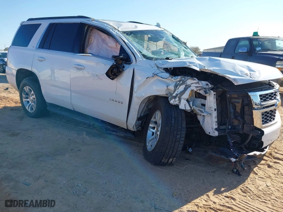 2020 Chevrolet Tahoe LT with VIN 1GNSKBKC1LR264762, listed as a IAAI auction lot 41037026 with 95,644 mi miles. Bid and sale history available at carsss.com. Image 1.