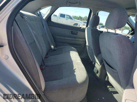 2005 Ford Taurus SE with VIN 1FAFP53U75A302281, listed as a Copart auction lot 53552465 with 100,413 mi miles and Salvage Title. Bid and sale history available at carsss.com. Image 10.