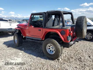 2003 Jeep Wrangler Rubicon z VIN 1J4FA69S93P352899, wystawiony jako Copart lot #56054425 z przebiegiem 3761 mil mil oraz Szkoda całkowita • Salvage title. Historia ofert i sprzedaży dostępna na DreamBid. Obrazek 2.