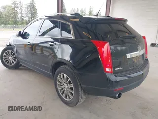 2014 Cadillac SRX Luxury Collection z VIN 3GYFNEE36ES677883, wystawiony jako IAAI lot #42260861 z przebiegiem 51 730 mil mil oraz . Historia ofert i sprzedaży dostępna na DreamBid. Obrazek 3.