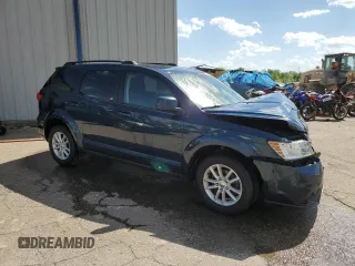 2013 Dodge Journey SXT with VIN 3C4PDCCG1DT637534, listed as a Copart auction lot 56992205 with 128,531 mi miles and Clean title. Bid and sale history available at DreamBid. Image 4.