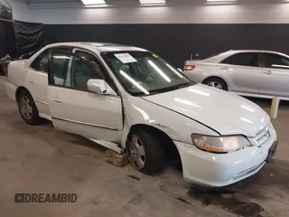 2002 Honda Accord EX z VIN 1HGCG16552A058153, wystawiony jako IAAI lot #42114883 z przebiegiem 176 128 mil mil oraz . Historia ofert i sprzedaży dostępna na DreamBid. Obrazek 1.