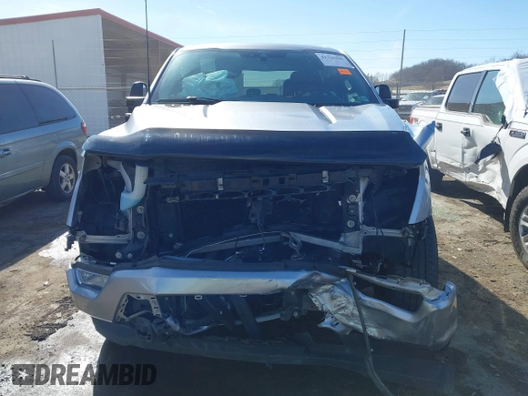 2021 Ford F-150 XL with VIN 1FTEW1EP2MFC44056, listed as a IAAI auction lot 41716105 with 58,979 mi miles and . Bid and sale history available at DreamBid. Image 13.