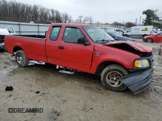 2003 Ford F-150 XL with VIN 1FTRX17W43NB33905, listed as a Copart auction lot 44441035 with 185,898 mi miles and Salvage Title. Bid and sale history available at carsss.com. Image 4.
