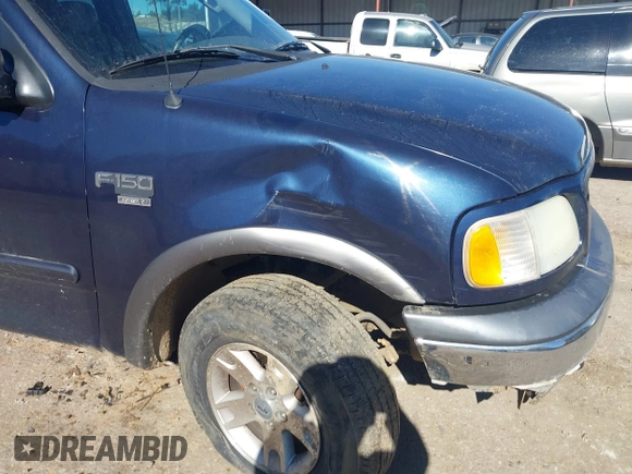 2003 Ford F-150 XL with VIN 1FTRX18L73NB36799, listed as a IAAI auction lot 41317602 with 270,075 mi miles. Bid and sale history available at carsss.com. Image 15.