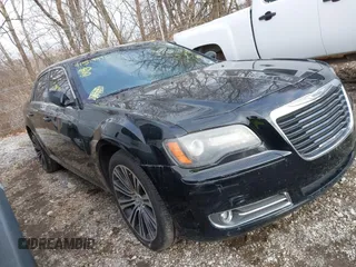 2013 Chrysler 300 with VIN 2C3CCABT4DH709506, listed as a IAAI auction lot 41519992 with 192,617 mi miles. Bid and sale history available at carsss.com. Image 1.