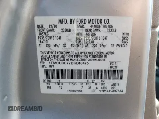 2011 Ford Escape XLS z VIN 1FMCU0C77BKB10475, wystawiony jako Copart lot #65480065 z przebiegiem 90 760 mil mil oraz Czysty tytuł • Clean title. Historia ofert i sprzedaży dostępna na DreamBid. Obrazek 13.