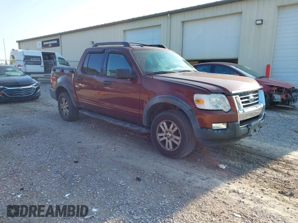 2010 Ford Explorer Sport Trac XLT z VIN 1FMEU3BE3AUA41619, wystawiony jako IAAI lot #41964282 z przebiegiem 189 377 mil mil oraz . Historia ofert i sprzedaży dostępna na DreamBid. Obrazek 1.