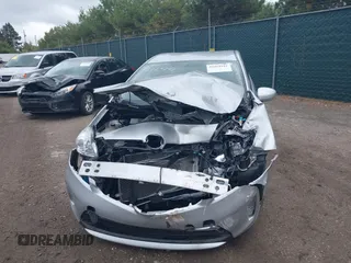 2015 Toyota Prius Four z VIN JTDKN3DU0F0455819, wystawiony jako IAAI lot #42169941 z przebiegiem 63 861 mil mil oraz . Historia ofert i sprzedaży dostępna na DreamBid. Obrazek 12.
