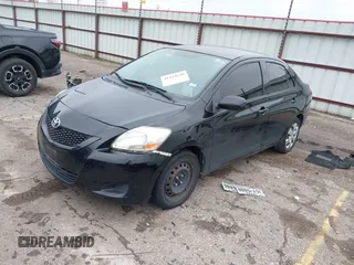 2012 Toyota Yaris with VIN JTDBT4K31CL025197, listed as a IAAI auction lot 41424640 with 165,731 mi miles. Bid and sale history available at carsss.com. Image 2.