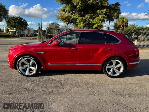 2017 Bentley Bentayga W12 z VIN SJAAC2ZV1HC014037, wystawiony jako Copart lot #54799655 z przebiegiem 36 099 mil mil oraz Szkody całkowita. Historia ofert i sprzedaży dostępna na DreamBid. Obrazek 12.