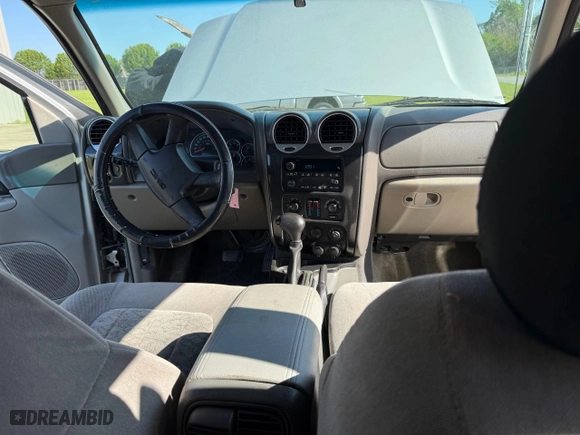 2004 GMC Envoy SLT with VIN 1GKDS13S742190702, listed as a Copart auction lot 52557035 with 202,843 mi miles and Clean Title. Bid and sale history available at carsss.com. Image 9.