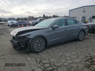 2022 Hyundai Sonata Hybrid SEL with VIN KMHL34JJ2NA043349, listed as a Copart auction lot 44950135 with 70,128 mi miles and Salvage Title. Bid and sale history available at carsss.com. Image 1.