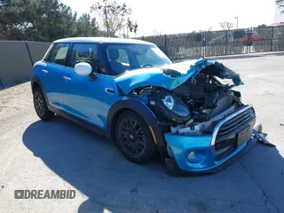2019 MINI Hardtop 4 Door Cooper with VIN WMWXU1C53K2J02378, listed as a IAAI auction lot 41297292 with 26,594 mi miles and . Bid and sale history available at DreamBid. Image 1.