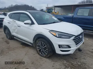 2019 Hyundai Tucson Ultimate with VIN KM8J3CALXKU016834, listed as a IAAI auction lot 40970606 with 104,208 mi miles. Bid and sale history available at carsss.com. Image 1.