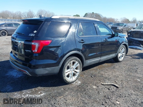 2016 Ford Explorer XLT with VIN 1FM5K7D89GGA84874, listed as a IAAI auction lot 41612708 with 124,421 mi miles. Bid and sale history available at carsss.com. Image 4.