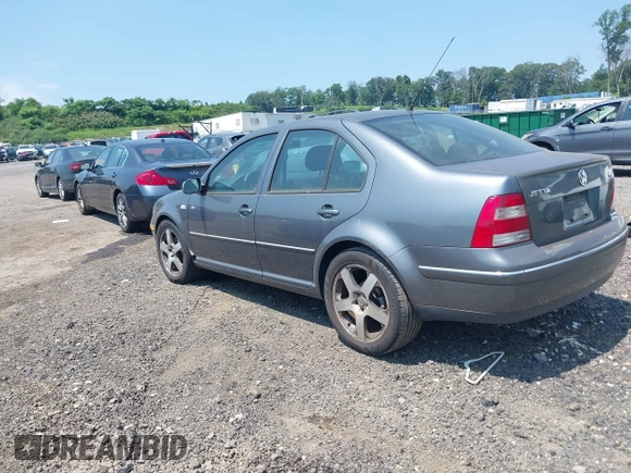 2004 Volkswagen Jetta GL with VIN 3VWRR69M04M128597, listed as a IAAI auction lot 42657556 with 283,728 mi miles and . Bid and sale history available at DreamBid. Image 3.